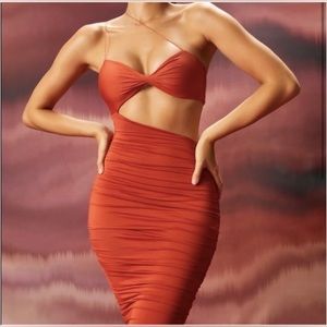 oh polly ruched asymmetric midi dress in rust